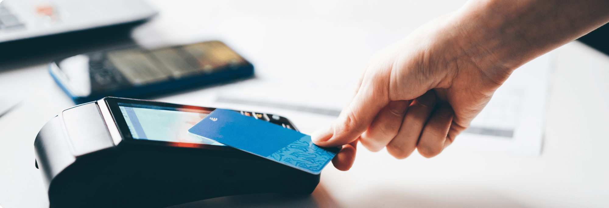 customer-making-purchase-using-contactless-payment-2025-01-09-12-27-22-utc 1