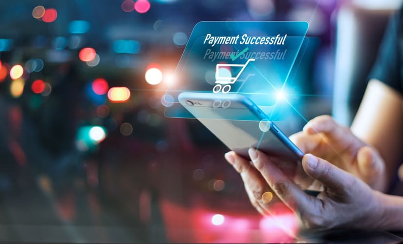 a buyer making a mobile payment on an item that is on an interest free payment plan